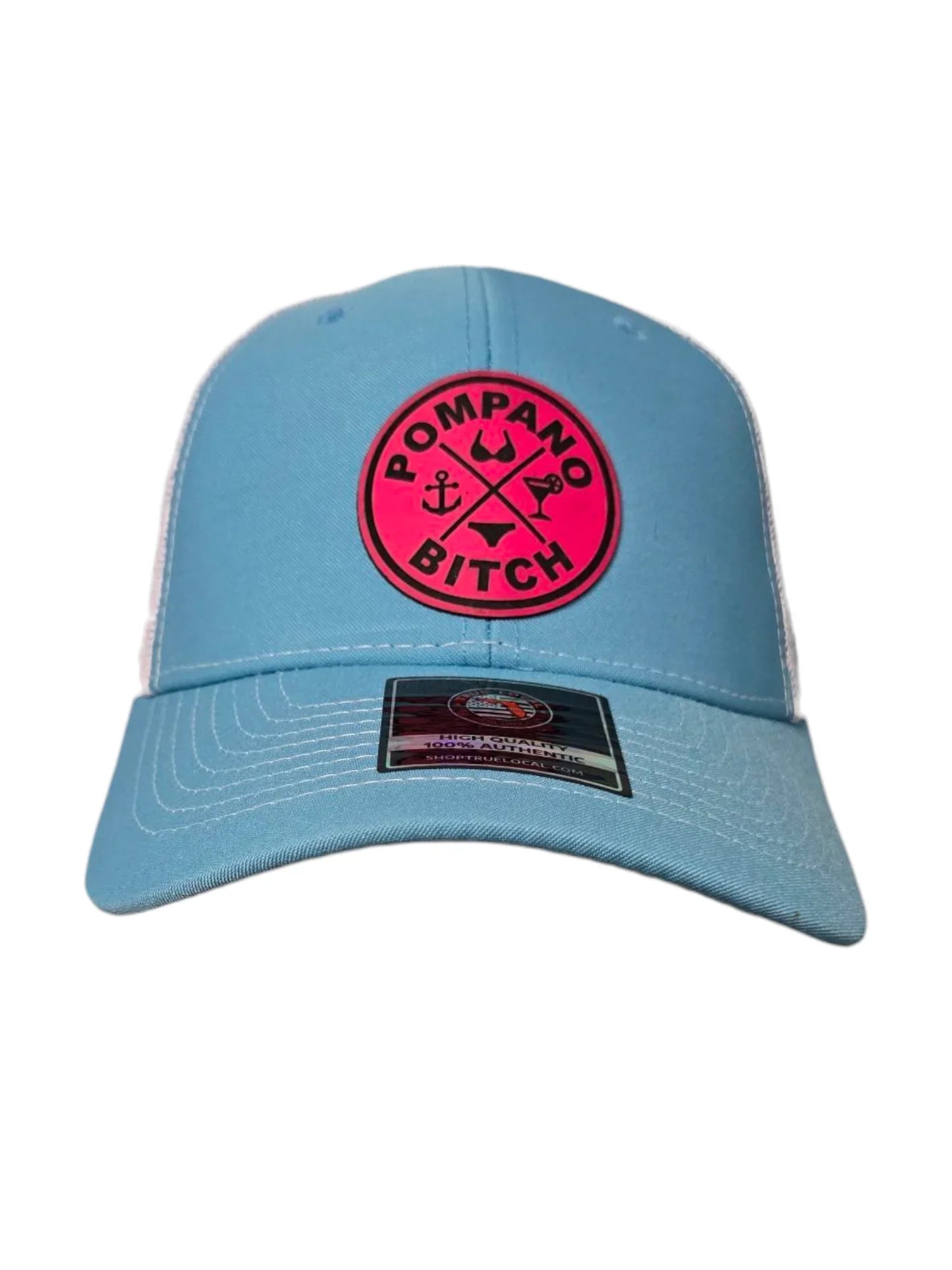 Light blue Pompano Beach trucker hat with bold pink 'Pompano Bitch' patch, anchor, and cocktail design