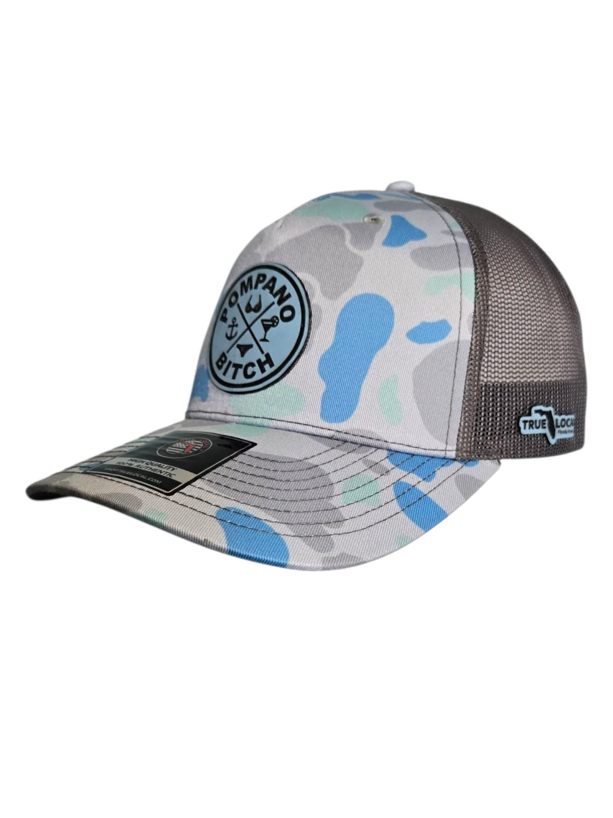 Pompano Bitch camo trucker hat with blue, gray, and white pattern, featuring local Florida pride design.