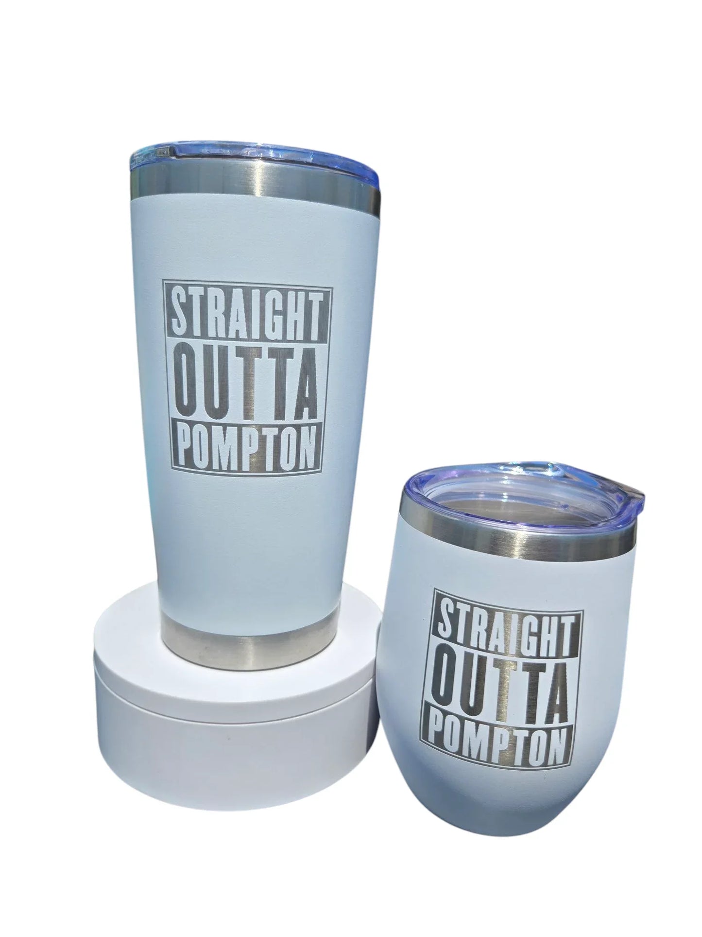Two light blue insulated tumblers with 'Straight Outta Pompton' text, featuring clear lids and stainless steel accents.