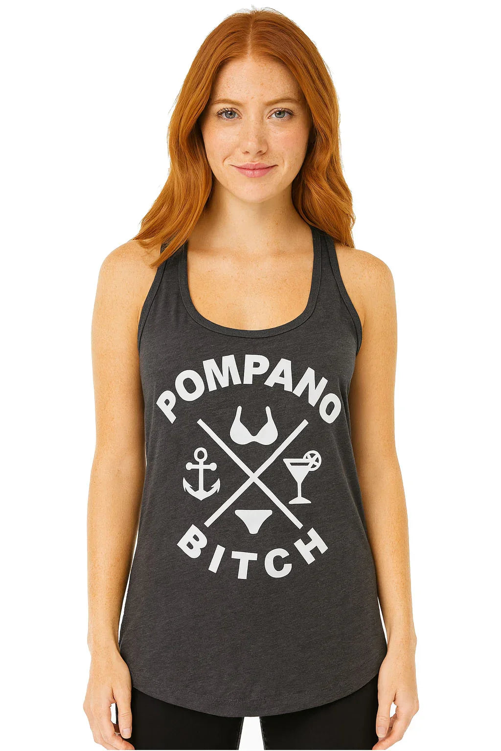 Woman wearing dark gray tank top with 'Pompano Bitch' graphic, anchor, bikini, and cocktail icons — Florida beach apparel
