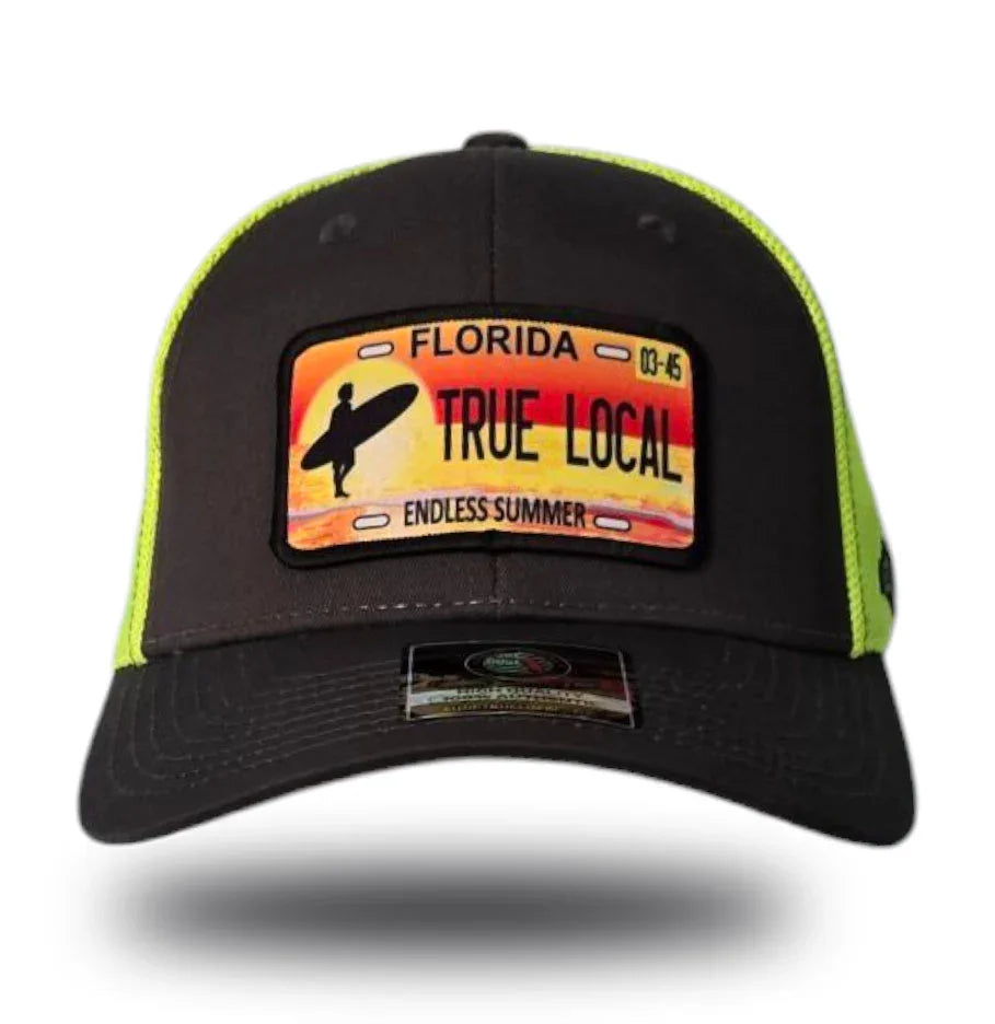 Black and neon green trucker hat with Florida 'True Local Endless Summer' surf patch, perfect for beach vibes.