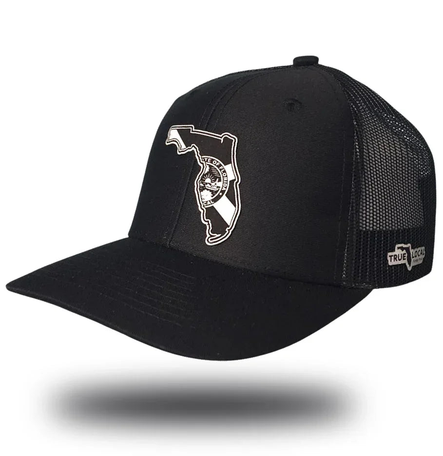 Florida Proud leather patch trucker hat front – laser-engraved Sunshine State outline snapback cap
