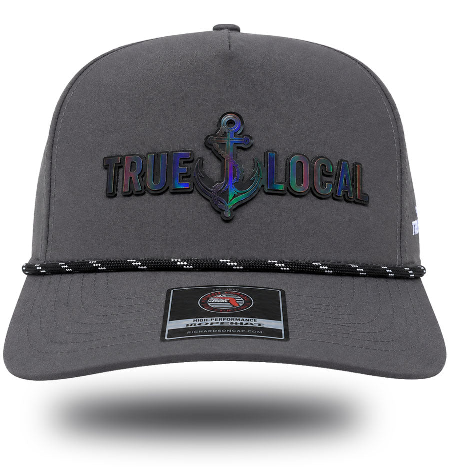 Darkwater Glow anchor patch showing shifting color in direct light, front view of gun gray rope hat