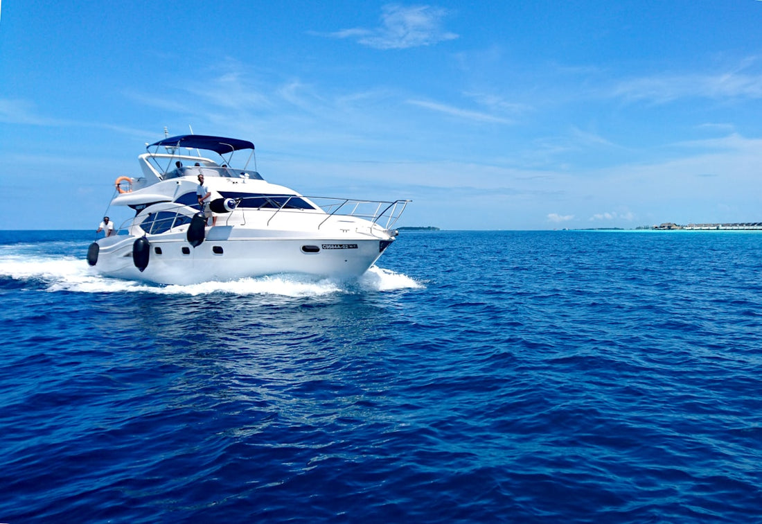Motorboat cruising on blue ocean water on a sunny boat day in South Florida