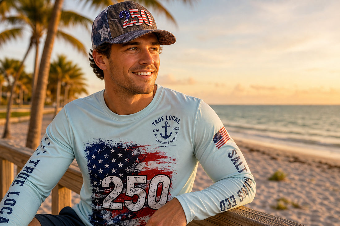 True Local 250th Anniversary collection — patriotic hat and long sleeve performance shirt on a Florida beach