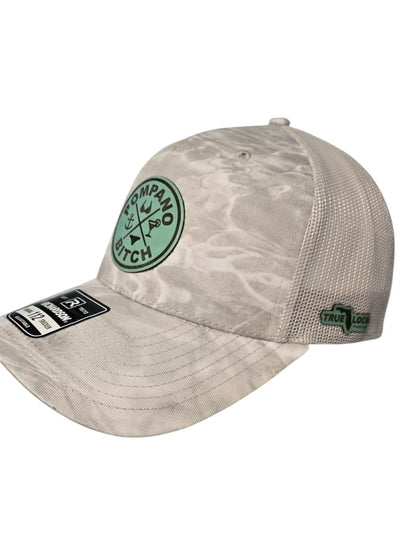 Pompano Bitch trucker hat with mint green patch, camo pattern, and True Local Florida badge