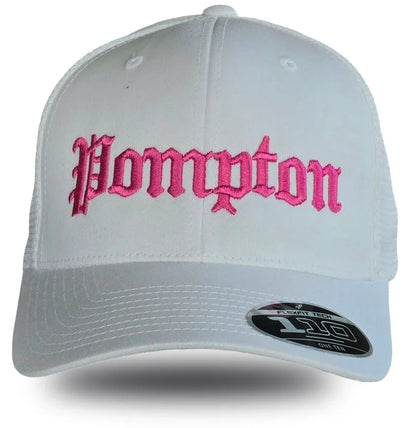 White trucker hat with pink embroidered 'Pompton' text, Flexfit Tech 110 label, local pride apparel