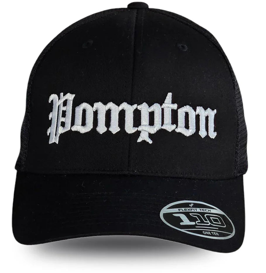 Black Pompton trucker hat with white gothic embroidery, Flexfit 110 tech, local pride apparel