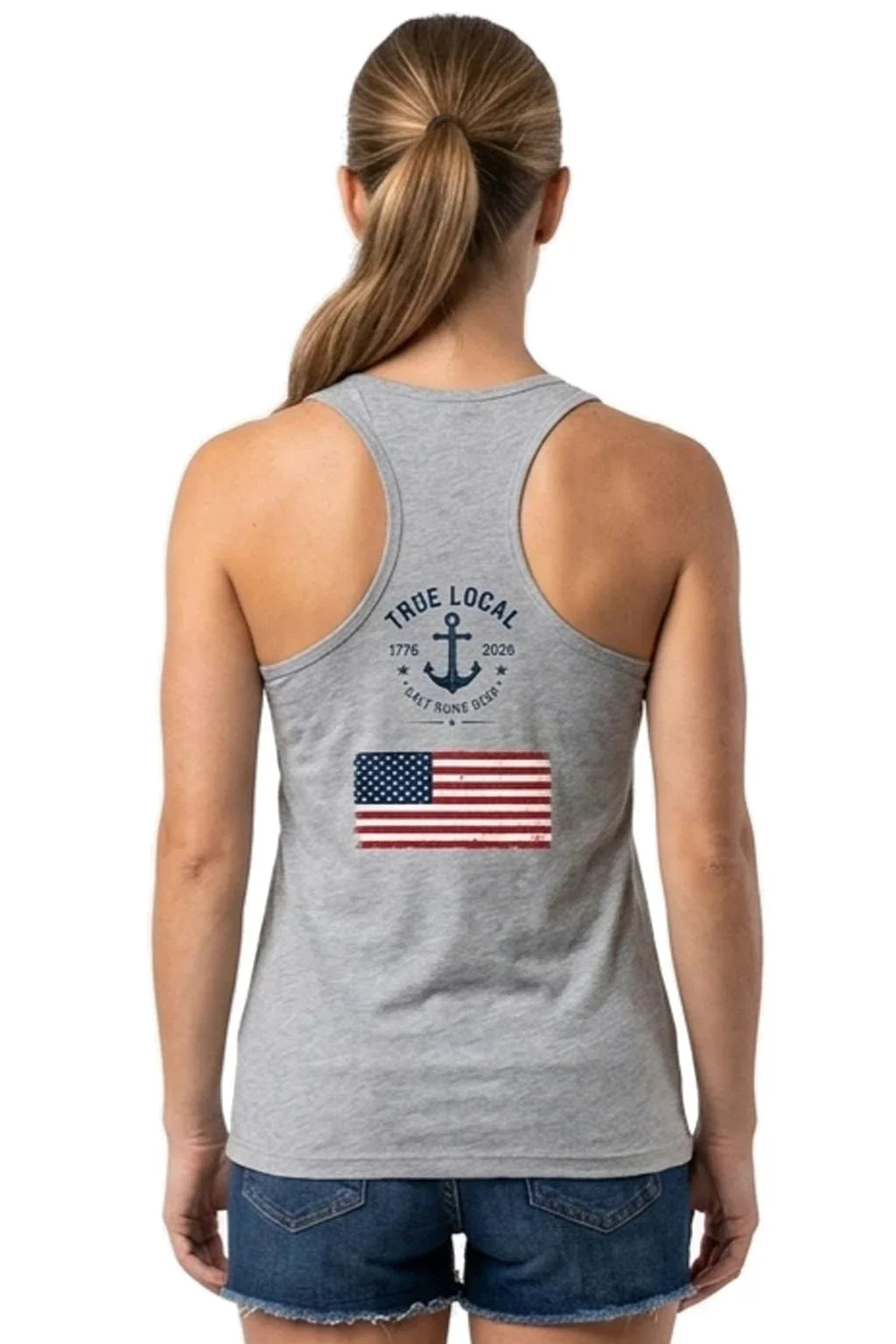 Gray tank top with anchor, 'True Local' text, and American flag graphic on back, worn by woman