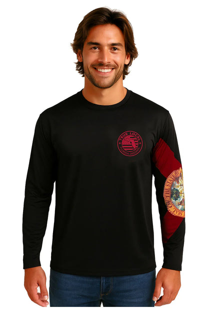 Man wearing black long sleeve Florida pride shirt with state seal sleeve design and chest logo