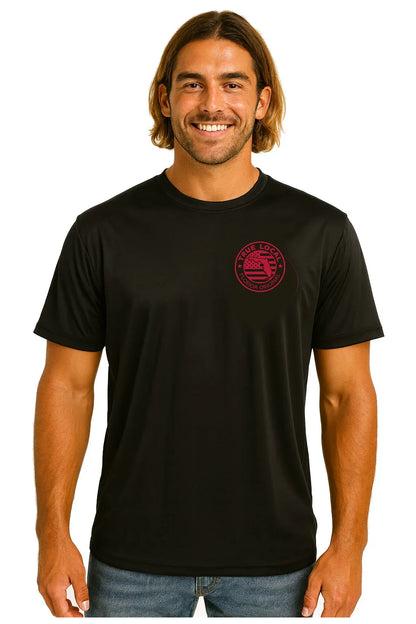 Man wearing black Florida Original t-shirt with red circular logo, celebrating local Florida pride