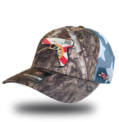 Camouflage trucker hat with Florida flag pistol graphic and star-pattern mesh back