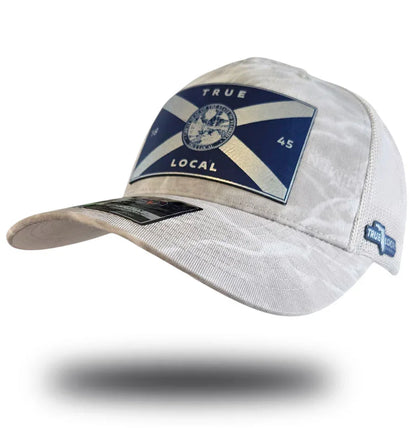 White True Local cap with blue and white flag patch, bold lettering, and side logo, celebrating Florida local pride.