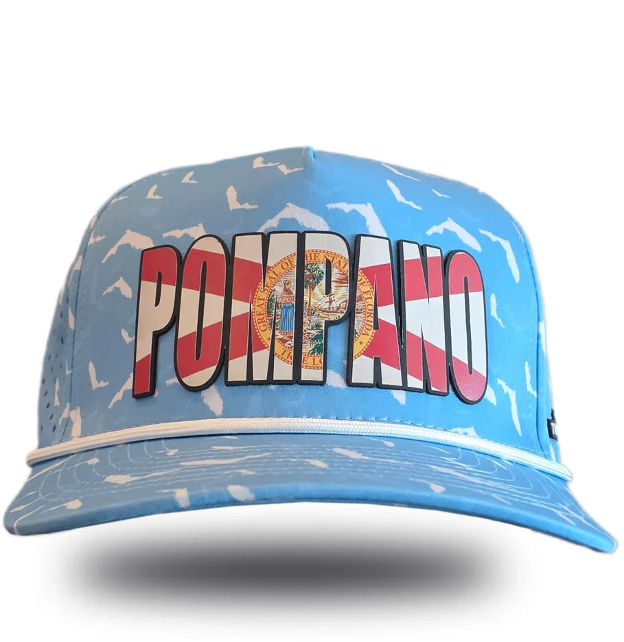 Blue Pompano Beach hat with Florida flag design and seagull print, celebrating local Florida pride.