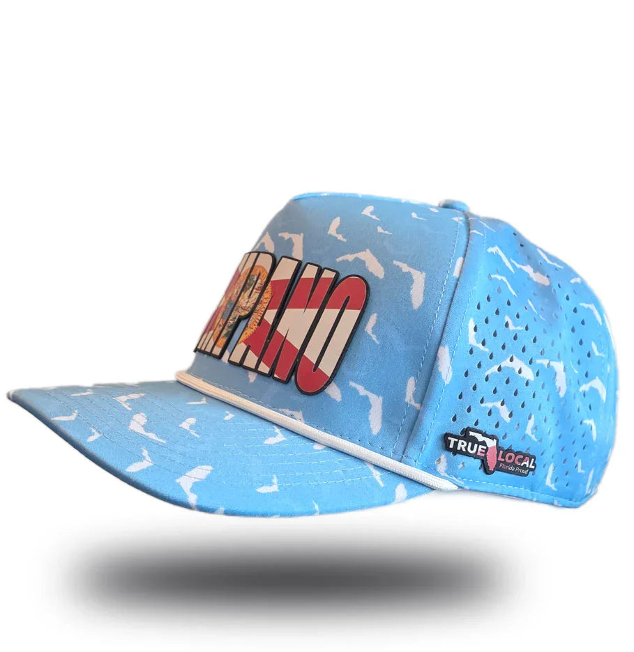 Light blue Pompano Beach hat with bold 'POMPA' lettering, fish print, and True Local Florida pride patch