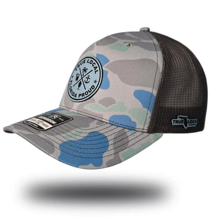 Florida Proud camo trucker hat with anchor & palm tree logo, mesh back, True Local branding