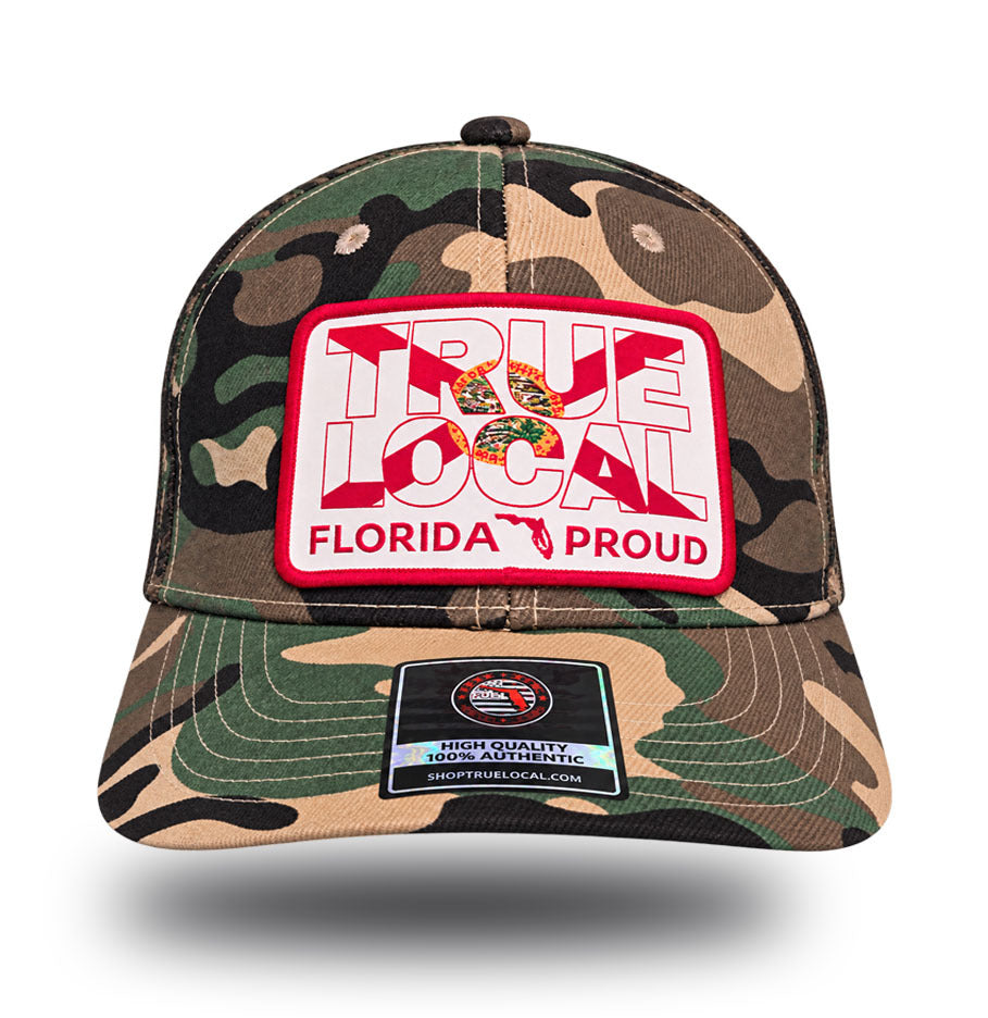 Florida Proud camo trucker hat front with True Local Florida flag patch, Florida Proud and state outline