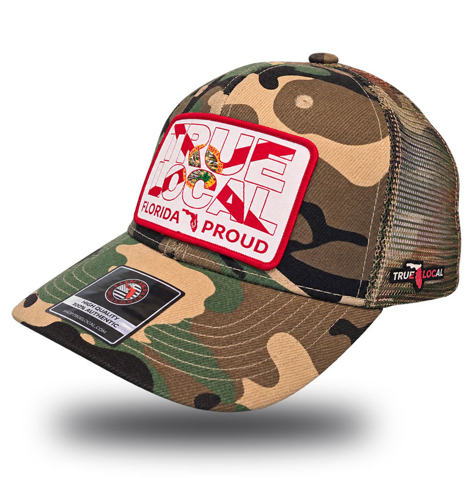 Florida Proud all-over camo trucker hat side view with True Local Florida flag patch and camo mesh back