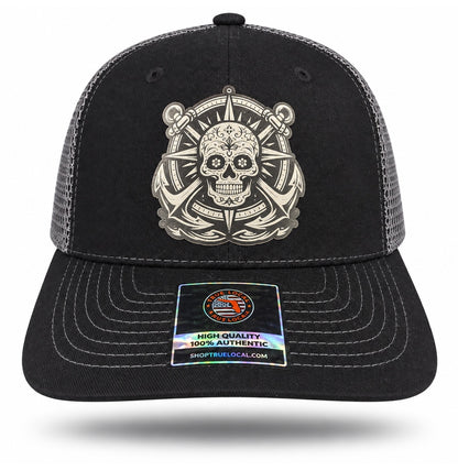 Black and Gray Sugar Skull Anchor Trucker Hat, front view showing sugar skull compass and twin-anchor patch