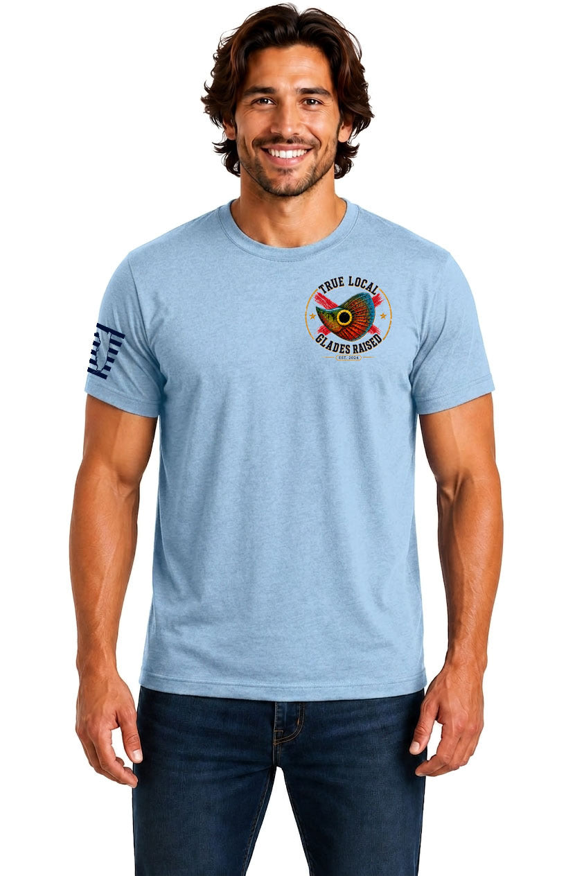 True Local Glades Raised Peacock Bass T-Shirt – Light Blue - Front