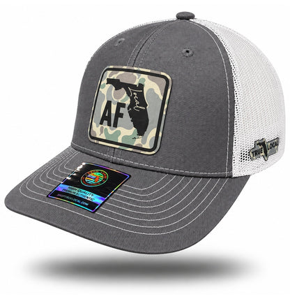 Gray Local AF Florida Camo Patch Trucker Hat, bill pointing left with side panel and True Local embroidery
