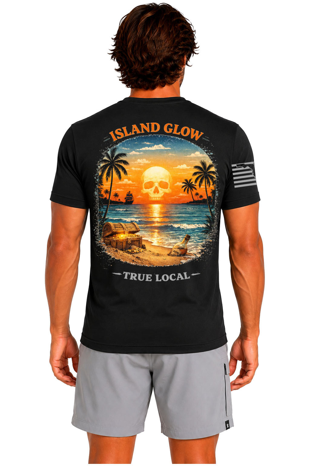Black Skull Sunset Island Glow Tee back artwork - glowing pirate skull sunset beach scene