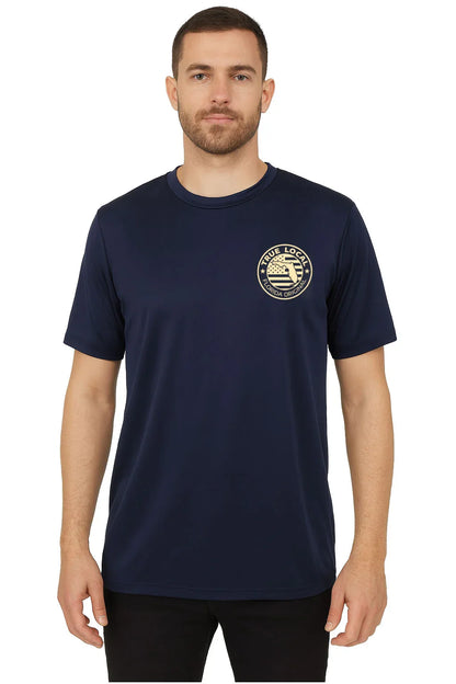 Man wearing navy blue Florida Original t-shirt with True Local circular logo, celebrating local pride in Pompano Beach.