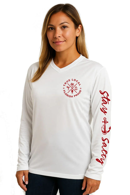 White long sleeve shirt with 'True Local Florida Proud' chest logo and 'Stay Salty' sleeve text, perfect for Florida beach lovers.