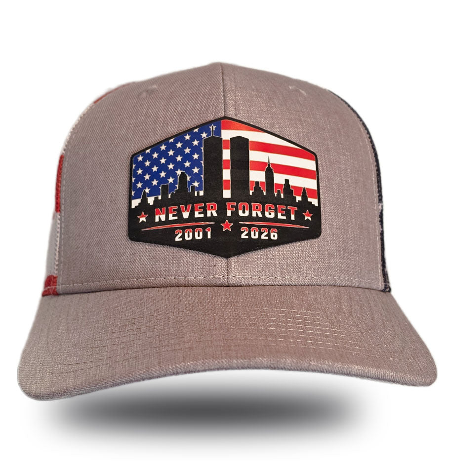 Never Forget 9/11 Memorial Trucker Hat front view - Twin Towers American flag patch with 2001-2026