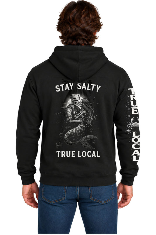 Black Stay Salty hoodie sweatshirt back with skeleton sailor and mermaid embracing under a full moon, Stay Salty and True Local text