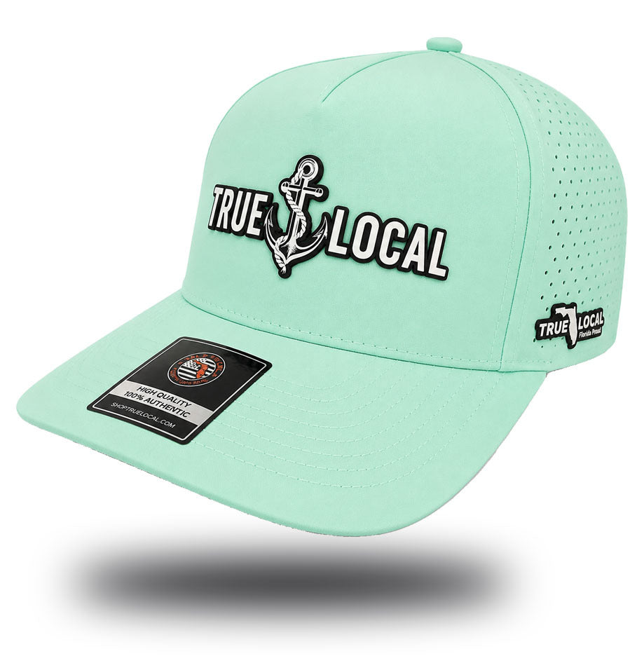 True Local women's anchor performance hat in Mangrove Mist mint green with iridescent patch side angle view