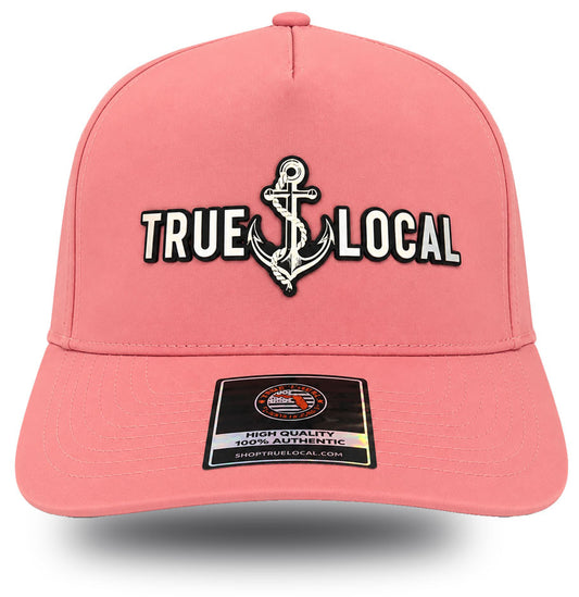 True Local women's anchor performance hat in Sea Hibiscus coral with iridescent holographic patch front view